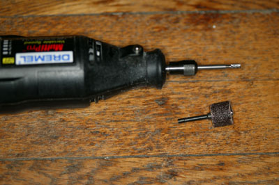 [The Dremel tool and bits]