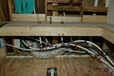 [Tub faucet and related plumbing]