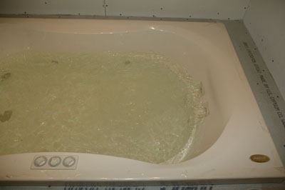 [Close-up of tub jets]
