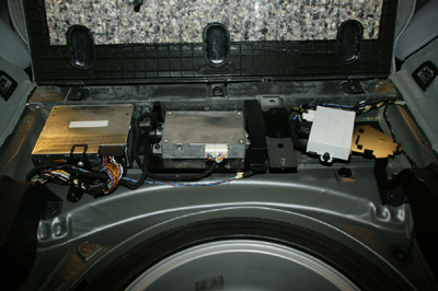 [trunk floor electronics compartment]