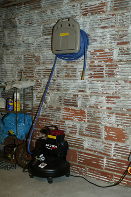 [Air compressor, hose, and hose reel]