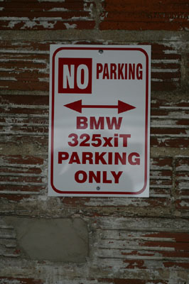 [Reserved Parking sign]